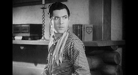 Johnny Mack Brown as Larry Kerrigan, upset that his new bride has stayed out all night and returned home drunk in Montana Moon (1930)