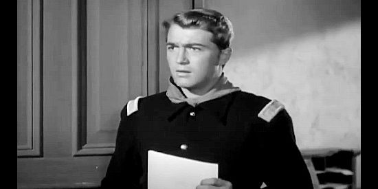 Johnny Sands as Randy Reid, a younger brother concerned about the way Larry Knight has treated his older sister in Massacre River (1949)