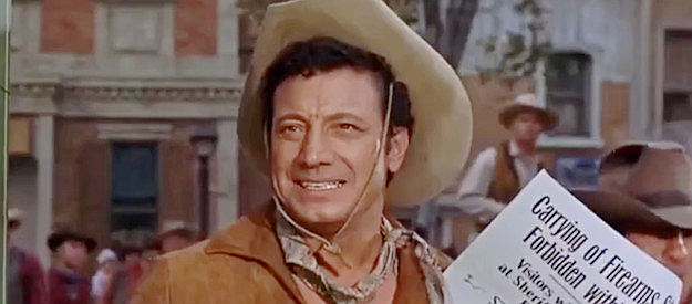 Johnny Seven as Loop, one of Grant Evers' hired guns, challenging Cal Wayne's ban on guns in Abilene in Gunfight in Abilene (1967)