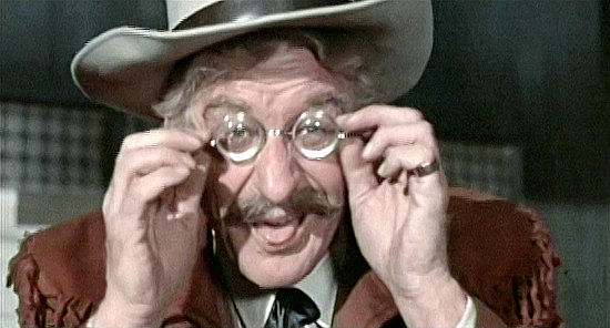 Jon Pertwee as Sheriff Albert Earp, hard of hearing, nearly blind and no match for The Rumpo Kid in Carry On Cowboy (1966)