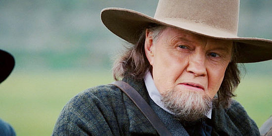 Jon Voight as Jacob Samuelson, meeting the members of the wagon train in September Dawn (2006)