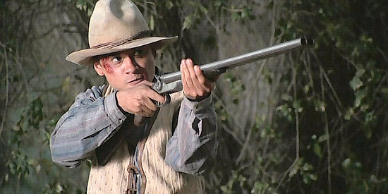 Jorge Pallo as Samuel, one of the men working on the Aguilar ranch in The Pledge (2008)