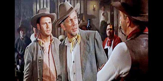 Joseph Cotton as John Breckenridge, running into trouble in a saloon with a pair of former Confederate soldiers in The Last Sunset (1961)