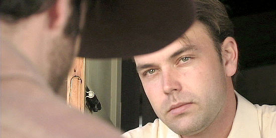 Justin Kreinbrink as John Cooper, checking on a wounded deputy in The Decoy (2006)