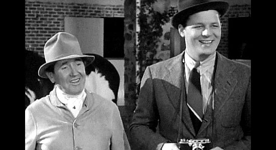 K.M Kerrigan as Thomas family employee Farr and Jack Carson as Stan Brown, the newspaperman who becomes 'Wild Bill's' publicist in The Kid from Texas (1939)