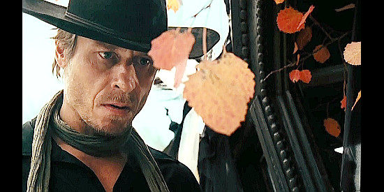 Karel Roden as The Stranger, finding his bounty in Dead Man's Bounty (2006)