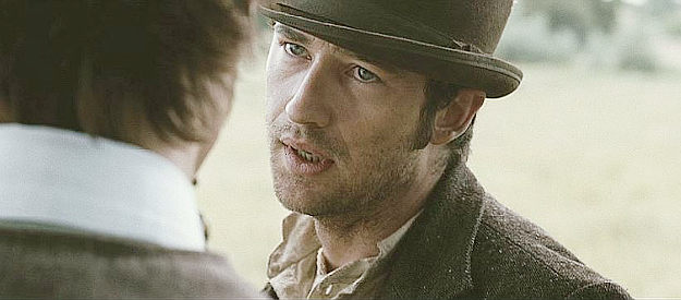 Karl Geary as Fergus Coffey, encouraging William Parcher to help search for the missing Stewart women in The Burrowers (2008)