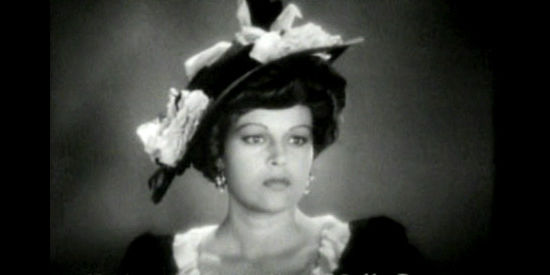 Katherine De Mille as Molly Brant, the lover Ace shoves aside when Ruby lands in New Orleans  in Belle of the Nineties (1934)