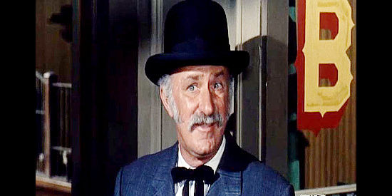 Keenan Wynn as Jed Curry, the rancher who wants Jim Cole's land for his growing sons in The Nigh of the Grizzly (1966)