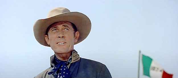 Ken Curtis as Capt. Almaron Dickinson, prepared to carry out Travis's orders in The Alamo (1960)