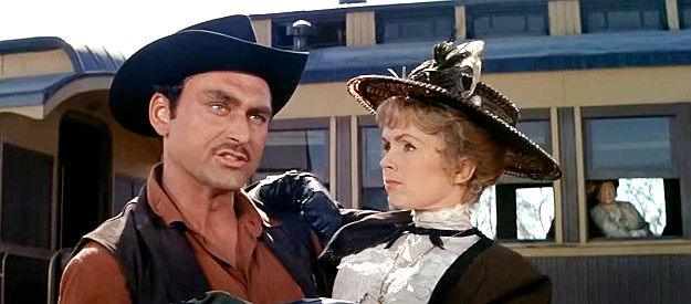 Ken Scott as Sheriff Burns, getting off on the wrong foot with Lu Rogers (Debbie Reynolds) by mistaking her as a member of the Little Rascals female dance troupe in The Second Time Around (1961)