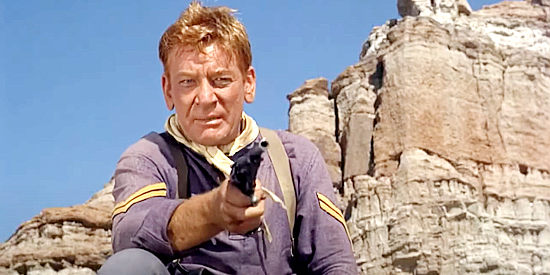 Kenneth Tobey as Cpl. Bodine, about to steal a shipment of rilfes so he can sell them to the Apache in 40 Guns to Apache Pass (1967)