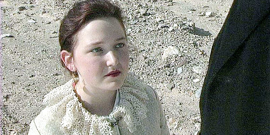 Kerlli Ruttle as Carolyn, the late wife Caleb misses so desperately in Gunfight at Yuma (2012)