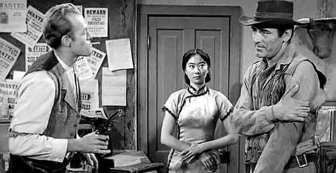 Kevin Hogan as Jack Fry, Lisa Lu as Ming Kwai and John Vivyan as Hayden in Rider on a Dead Horse (1962)