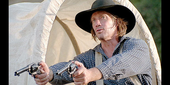 Kevin Sorbo as Sheriff Biggs, getting out of a dangerous situation in Prairie Fever (2008)