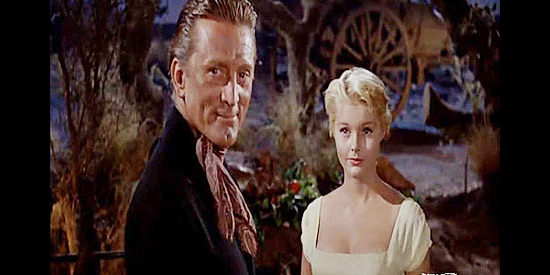 Kirk Douglas as Brendan O'Mally, reacting to the return of a yellow dress from his past, worn by Missy Breckenridge (Carol Lynley) in The Last Sunset (1961)