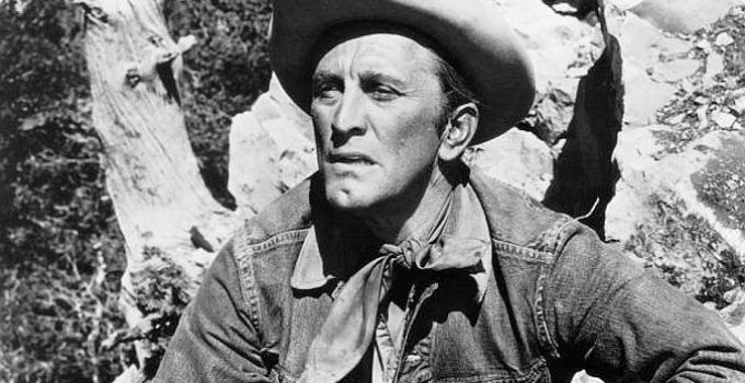Kirk Douglas as Jack Burns, on the watch for his pursuers in Lonely Are the Brave (1962)