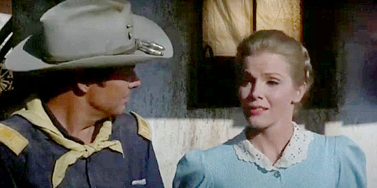 Laraine Stephens as Ellen Malone asking Capt. Coburn (Audie Murphy) to watch over her brothers in 40 Guns to Apache Pass (1967)