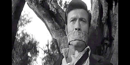 Laurence Havey as the Husband, bound, gagged and helpless as Juan Carrasco has his way with his wife in The Outrage (1964)