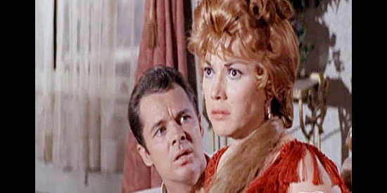 Laurie Mitchell as Tina Newville, her tryst with detective Bob Gifford (Audie Murphy) interrupted by a jealous lover in Gunfight at Comanche Creek (1964)