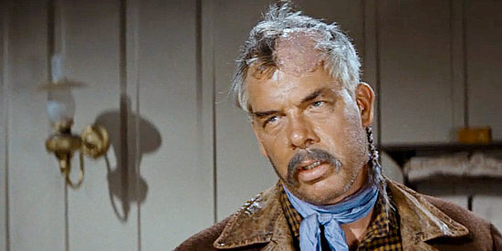 Lee Marvin as Tully Crow, the man who deals with the comancheros in The Comancheros (1961)