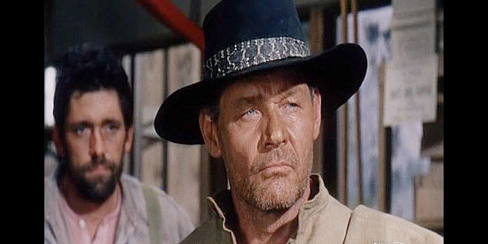 Leo Gordon as Cass Dowdy, a bounty hunter lured to town by the price on Satan's head in The Nigh of the Grizzly (1966)