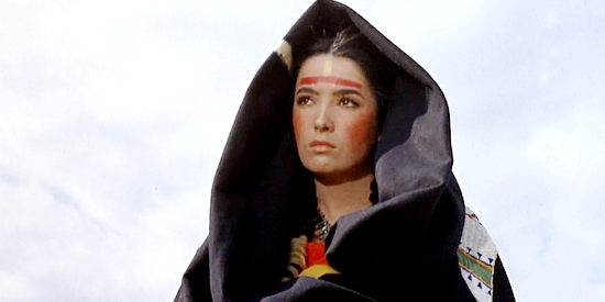 Linda Cristal as Elena de la Madriaga, warning that Stone Calf will try to recapture her in Two Rode Together (1961)