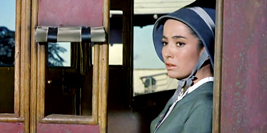 Linda Cristal as Elena de la Madriaga on a stage bound for California in Two Rode Together (1961)