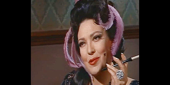 Linda Darnell as Sadie, a madam who takes her girl wherever the money's the best in Black Spurs (1965)