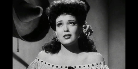 Linda Darnell as dance hall entertainer Chihuahua, pleading forgiveness from Doc Holliday in My Darling Clementine (1946)