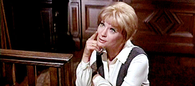 Lois Nettleton as Mary, humored by Flagg's attemtp to explain the 'world's oldest profession' to her son in The Good Guys and the Bad Guys (1969)