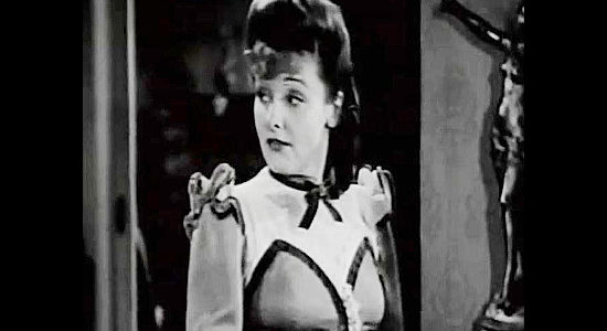 Lola Lane as Rita Molyneaux, the rich woman who helps finance Bent's railroad in Buckskin Frontier (1943)