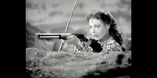 Loretta Young as Cherry de Longpre, intervening on Melody Jones behalf in Along Came Jones (1945)
