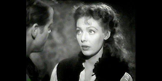 Loretta Young as Cherry de Longpre, worried about the changes she's seeing in Monte Jarrad in Along Came Jones (1945)