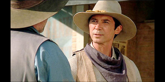 Lou Diamond Phillips as Bobby Hattaway, questioning the sheriff's commitment to his job in Lone Rider (2008)