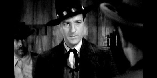 Louis Calhern as Sheriff Mannon, the crooked lawman used to getting his way in Silver City in The Arizonian (1935)