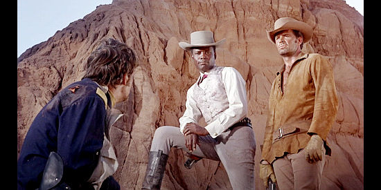 Lt. McAllister shares plans for escaping an Apache ambush with Toller (Sidney Potier) and Jess Remsberg (James Garner) in Duel at Diablo (1966)
