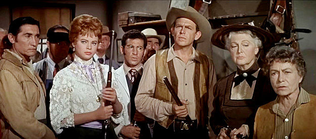 Lu Rogers' friends hatch a plan to free her from an outlaw gang in The Second Time Around (1961)