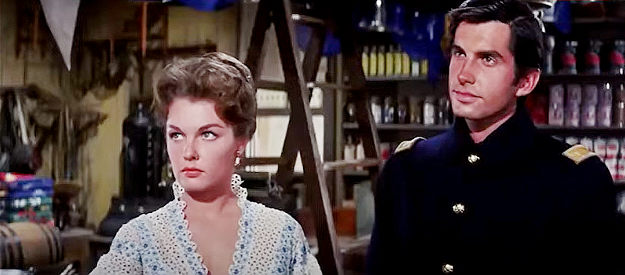 Luana Patten as Tracey Hamilton and George Hamilton as Lt. McQuade in A Thunder of Drums (1961)