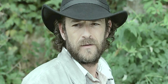 Luke Perry as John Goodnight, dispensing advice to the son he never knew in Goodnight for Justice, Measure of a Man (2012)