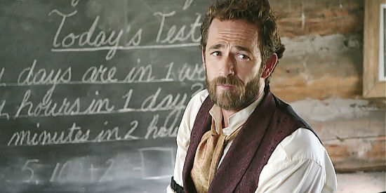 Luke Perry as John Goodnight, holding court in a school house in Goodnight for Justice (2011)