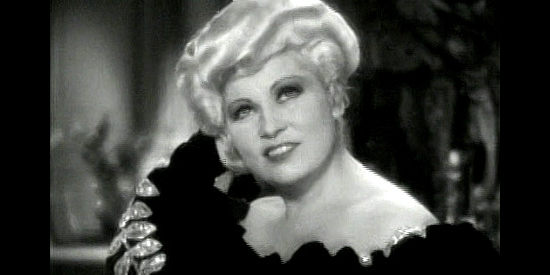 Mae West as Ruby Carter, giving her maid a lesson in men and love in Belle of the Nineties (1934)