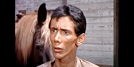 Marc Cavell as Pancho a knife-thrower extraordinate who convinces Tige to let him join the gang in Young Fury (1965)