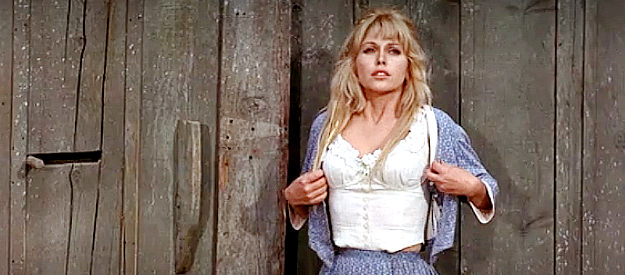 Margaret Blye as Billie Copperud, leaving the barn after her encounter with Lewton Cole in Waterhole #3 (1967)