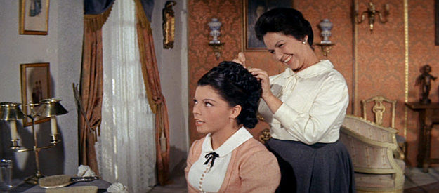 Maria Granada as Pilar Fortuna, expressing her love for Johnny to her servant Maria (Carmen Tarrazo) in Son of a Gunfighter (1965)