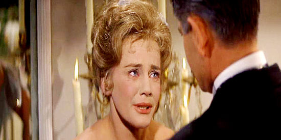 Maria Schell as Sabra Cravet, losing her already strained patience with husband Yancey in Cimarron (1960)