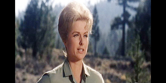 Martha Hyer as Angela Cole, wondering if its time for her husband to give up his dream ranch in The Night of the Grizzly (1966)