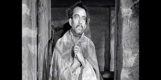 Martin Garralaga as Florencio, the man who relies on Ross McEwen to help save his wife and children in Four Faces West (1948)