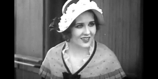 Mary Brian as Molly Stark, arriving West and wondering how many children she'll be teaching in The Virginian (1929)