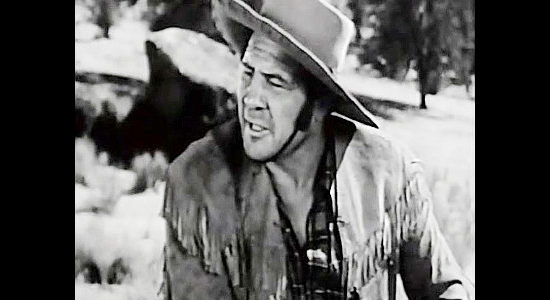 Max Baer as Tiny, Gideon Skene;s right-hand man, who isn't tiny at all in Buckskin Frontier (1943)